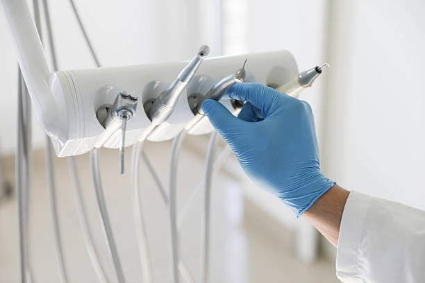 Professional Tooth Extraction technician working in Athens, IL